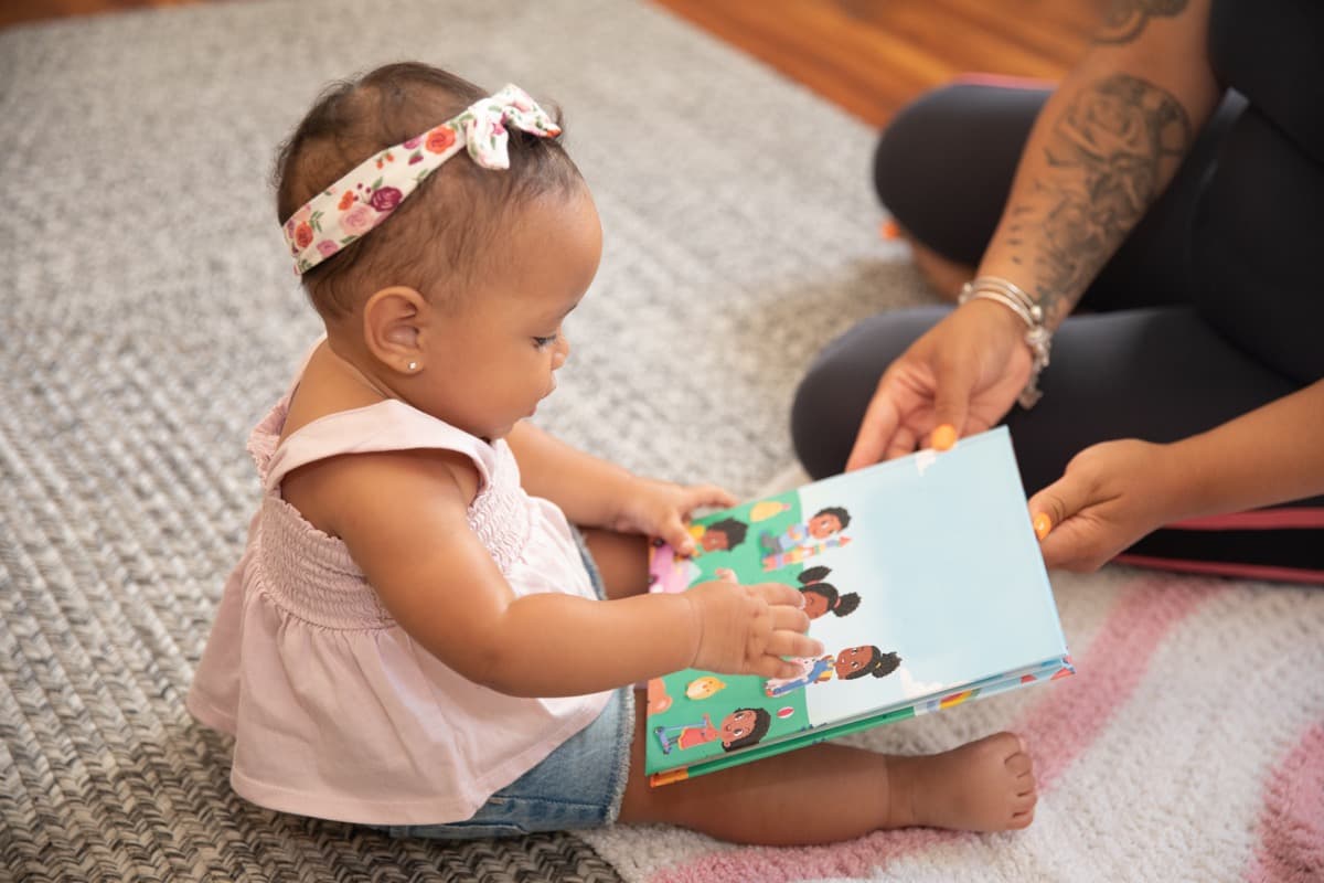 A therapist working one-on-one with a child during an applied behavior analysis session